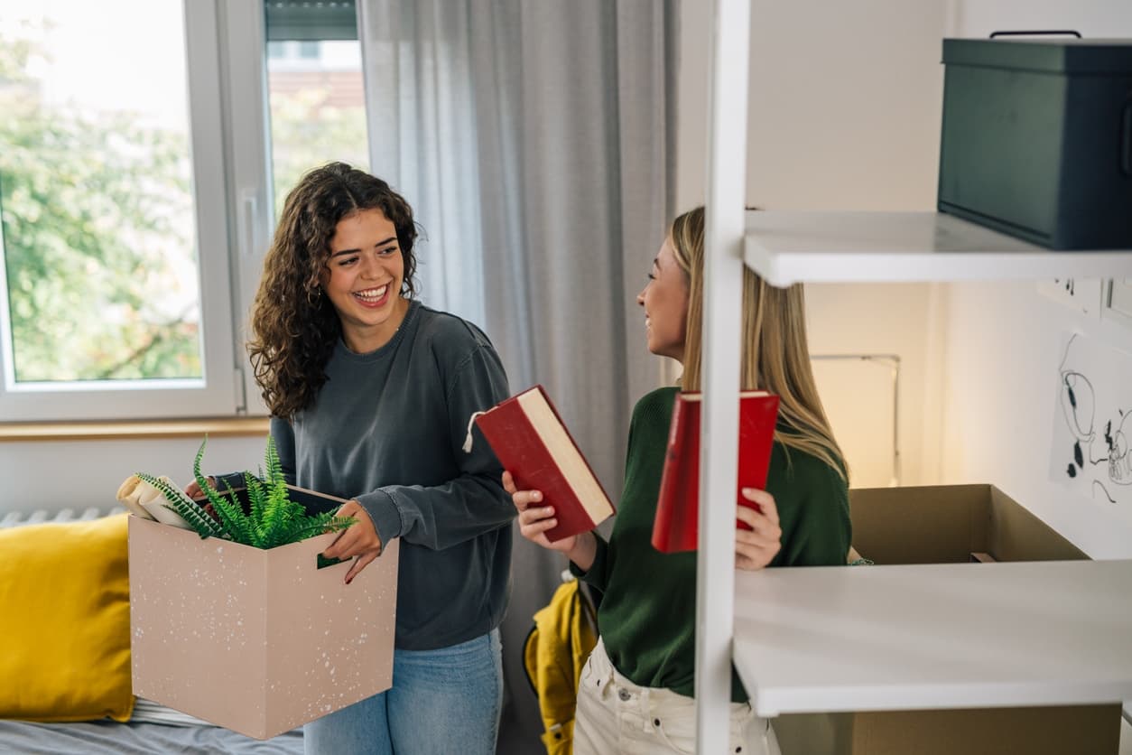 female students in dorm room