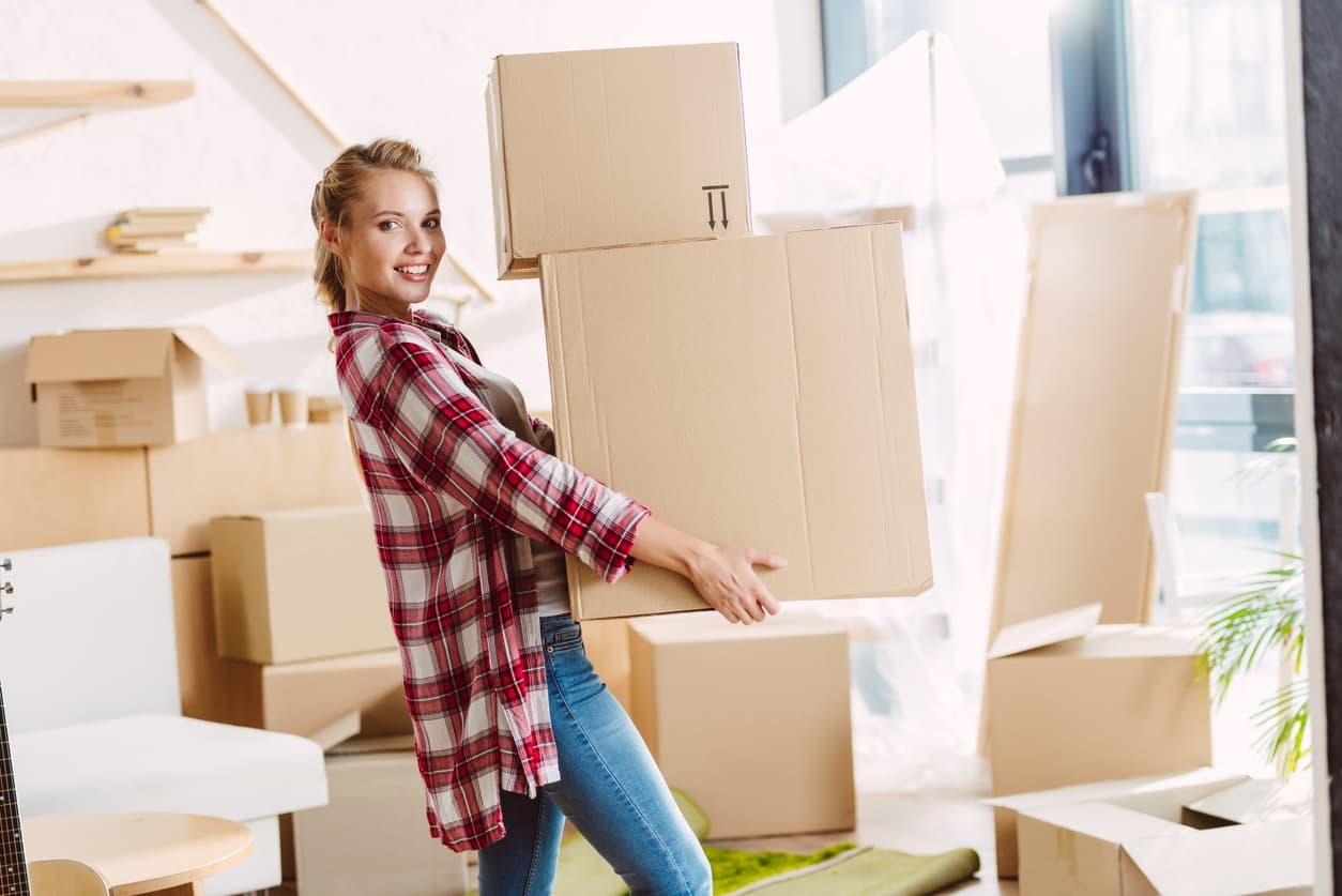 girl with cardboard boxes